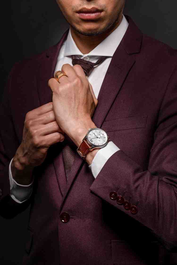 Close-up of man's wedding band showing detail