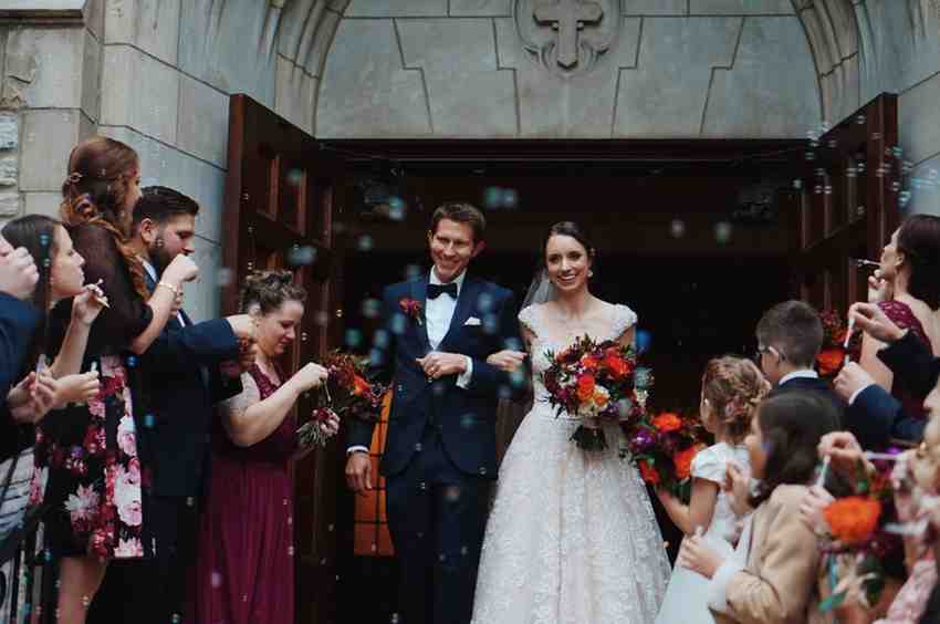 Elegant church wedding ceremony with bride and groom exchanging vows