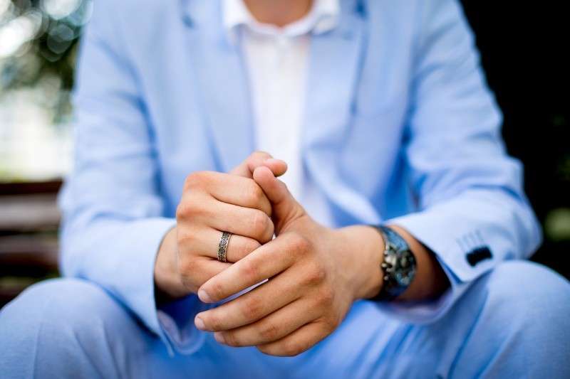 Man wearing wedding ring on right hand - Orthodox tradition