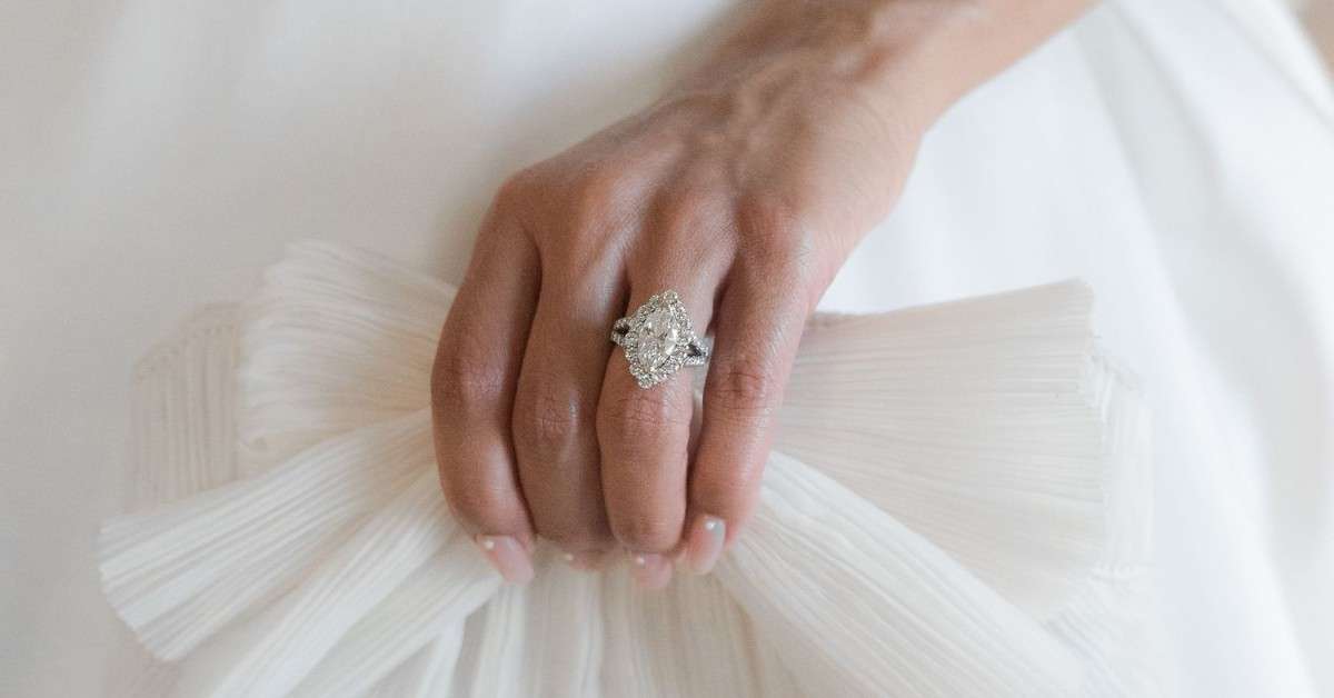 Modern couple choosing wedding ring placement together